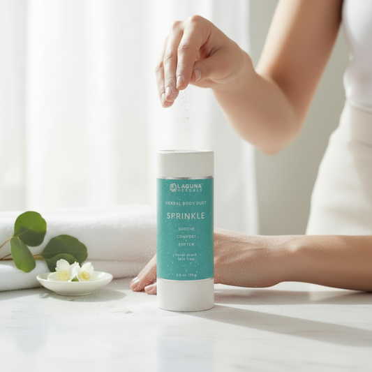 Person using a Laguna Naturals body scrub sprinkle can with a white background
